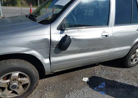 2002 Kia Sportage z USA, uszkodzony, nr VIN KNDJB723225109564